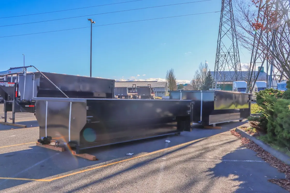 Roll-off dumpster ready for waste disposal at job site for 2 Yard Dumpster Rental in Mooresville